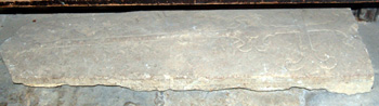 a medieval grave slab in Harrold church porch May 2008